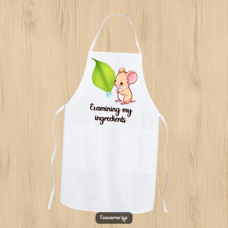 Funny apron showing a curious mouse examining a dewdrop on a leaf, perfect for a gentle and amusing cooking experience.