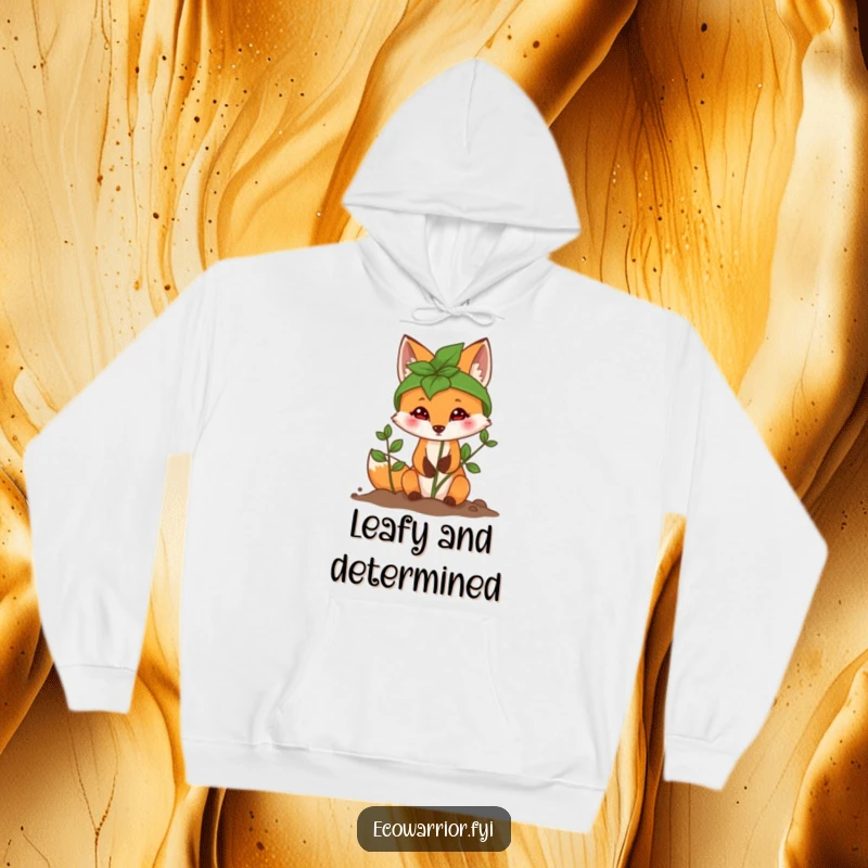 Funny Fox Hoodie featuring a determined fox wearing a leaf helmet while planting a sapling, cozy and inspiring.