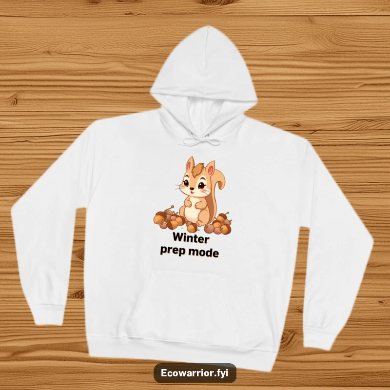 Funny determined squirrel intently collecting acorns, featured on a cozy hoodie for a humorous feel.
