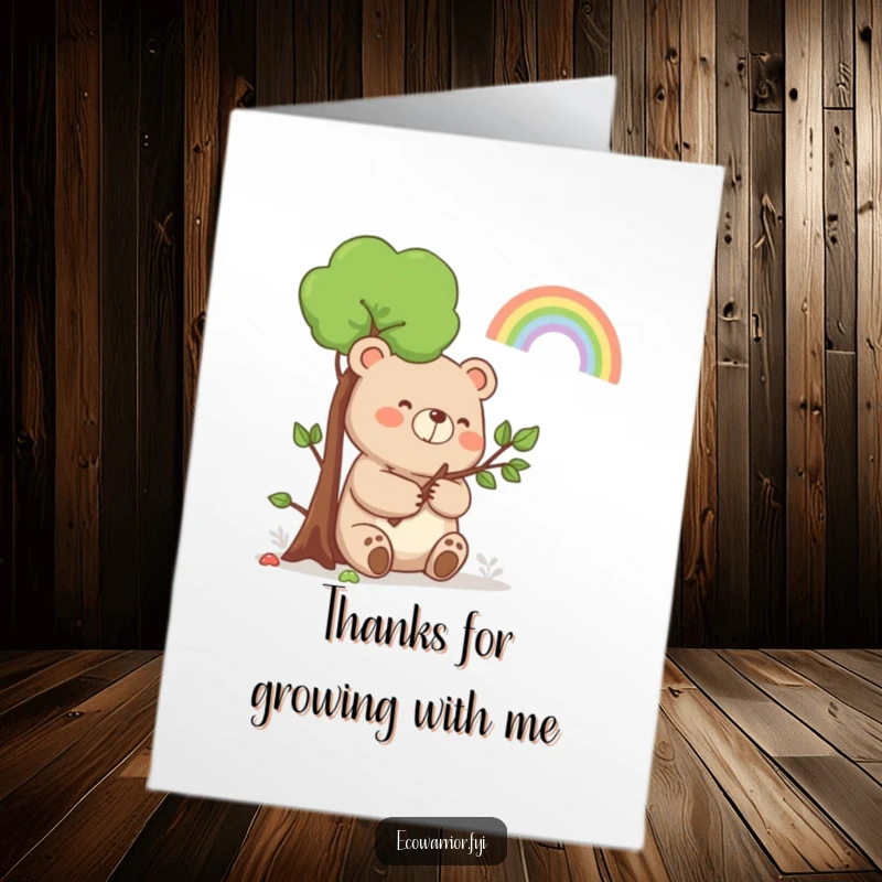Funny free printable thank you card of a happy bear holding a sapling, smiling at a rainbow, conveying sincere thanks.