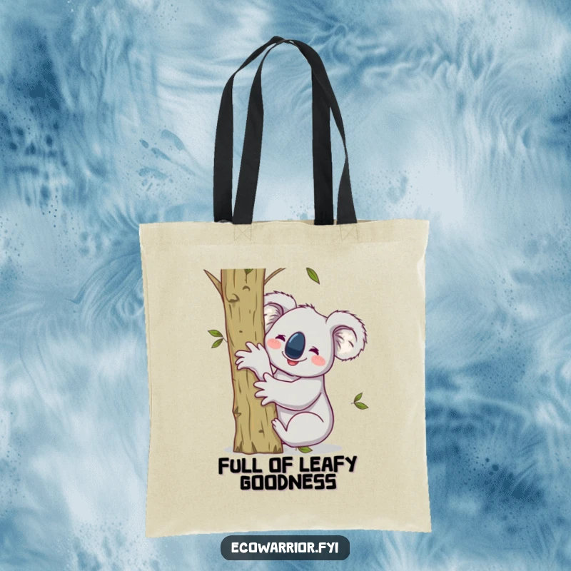 Funny tote bag with a smiling koala hugging a sapling, raising one arm victoriously, ready for eco-friendly errands.